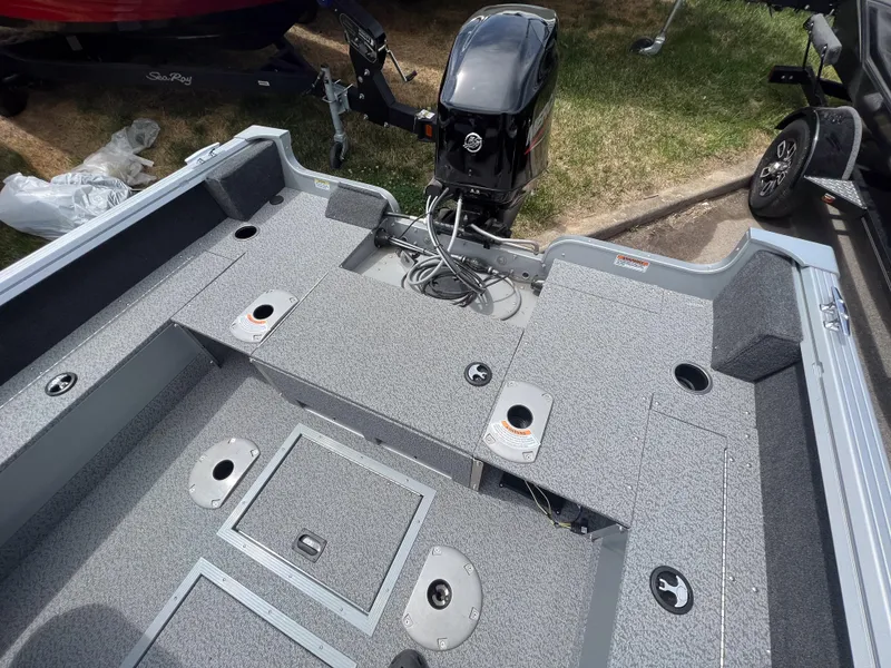 Slide: The Image of 2023 Starcraft Stealth 166 DC boat interior with Mercury outboard motor. - 3