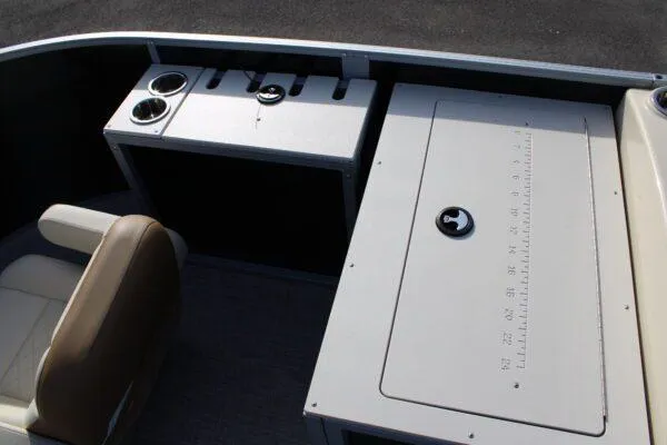 Slide: The Image of 2023 Lowe SF212 boat interior with seating and storage compartments. - 7