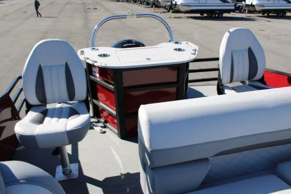 Slide: The Image of 2023 Lowe SF214 Sport Fish boat interior with seating and control console. - 7