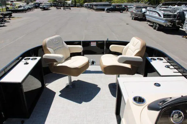 Slide: The Image of 2023 Lowe SF214 Sport Fish boat with two beige fishing seats. - 12