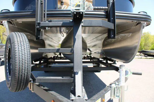 Slide: The Image of 2023 Lowe SF214 Sport Fish boat on trailer, close-up view of the hull and trailer frame. - 16