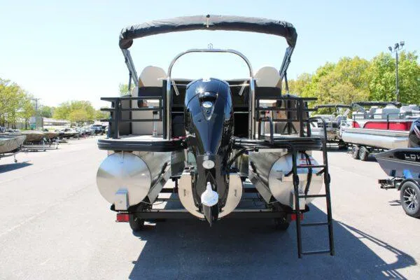 Slide: The Image of 2023 Lowe SF214 Sport Fish pontoon boat rear view with outboard motor. - 18
