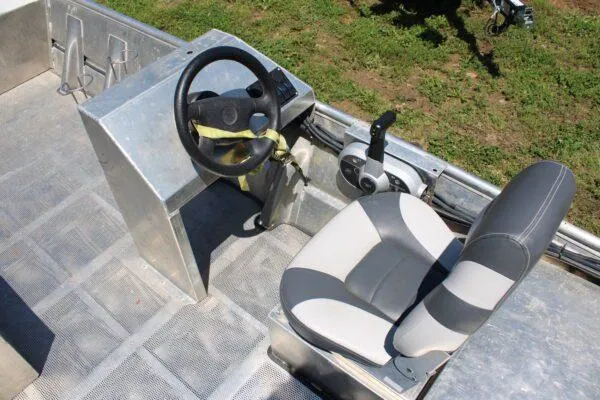 Slide: The Image of Blazer 1752 boat console and seat, 2020 model, with steering wheel and throttle control. - 6