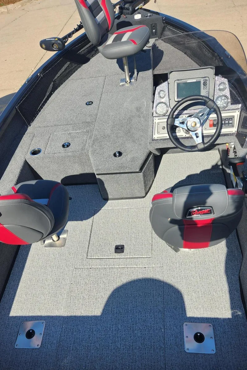Slide: The Image of 2023 Ranger VS1782SC Angler boat interior with steering console and seating. - 6