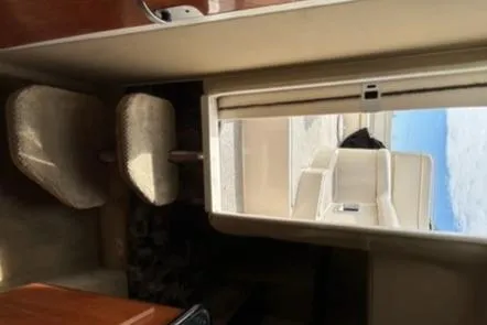 Slide: The Image of Interior view of 2003 Rinker 290 Fiesta Vee boat cabin. - 8