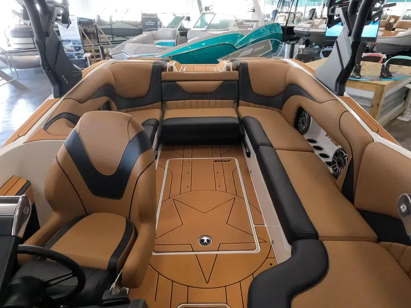 Slide: The Image of 2023 MB B52 Alpha boat interior with tan and black seating, modern design. - 19