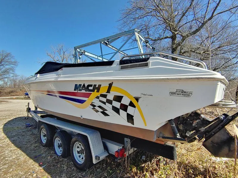 Slide: The Image of 1999 Baha Cruisers 290 Mach 1 boat on a trailer, side view. - 21