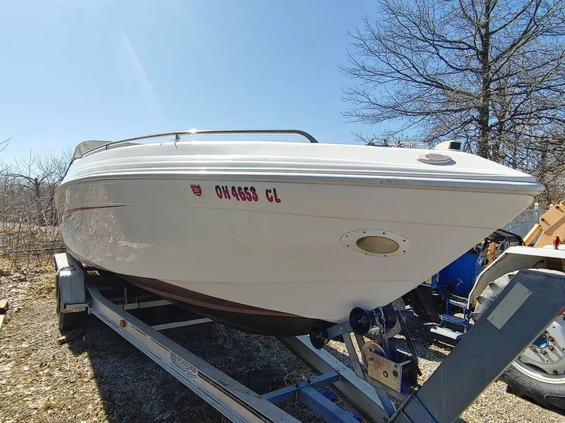 Slide: The Image of 1999 Baha Cruisers 290 Mach 1 boat on a trailer, side view. - 7