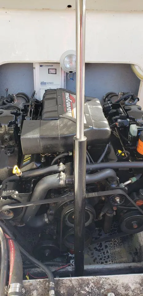 Slide: The Image of 1999 Baha Cruisers 290 Mach 1 engine compartment with visible components. - 8
