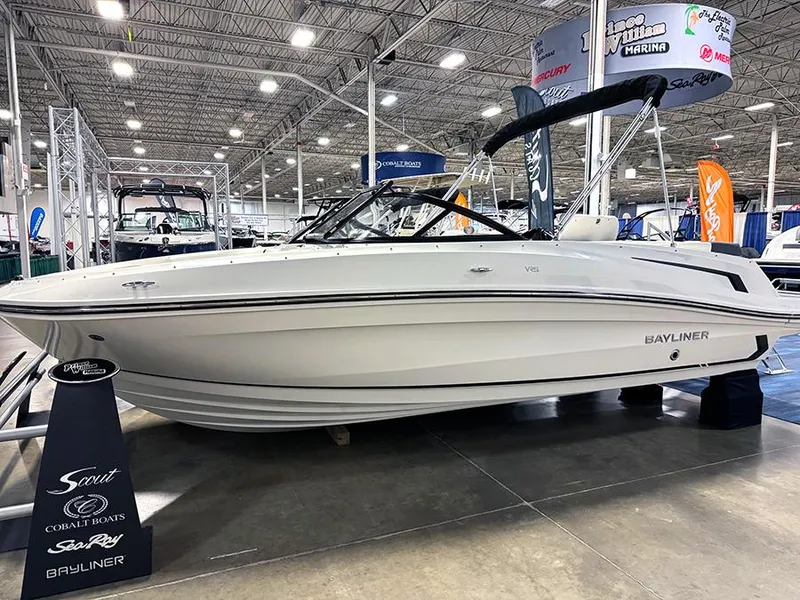 The Image of 2024 Bayliner VR5 boat displayed at an indoor boat show. - 0
