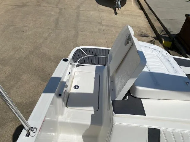 Slide: The Image of 2024 Bayliner VR5 boat with open storage compartment on deck. - 20