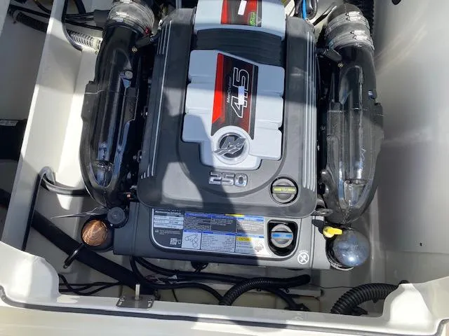 Slide: The Image of 2024 Bayliner VR5 engine compartment showcasing a powerful 4.5L 250 horsepower engine. - 22