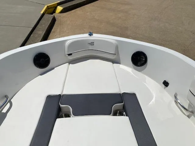 Slide: The Image of 2024 Bayliner VR5 boat interior with seating and speakers. - 8