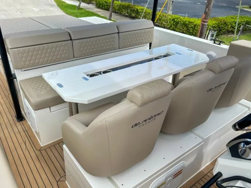 Slide: The Image of Luxurious seating and dining area on the 2024 De Antonio Yachts D28 Xplorer. - 17