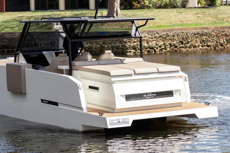Slide: The Image of 2024 De Antonio Yachts D28 Xplorer cruising on a calm waterway. - 4