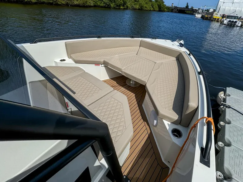 Slide: The Image of 2024 De Antonio Yachts D28 Xplorer with spacious seating and elegant design on the water. - 7