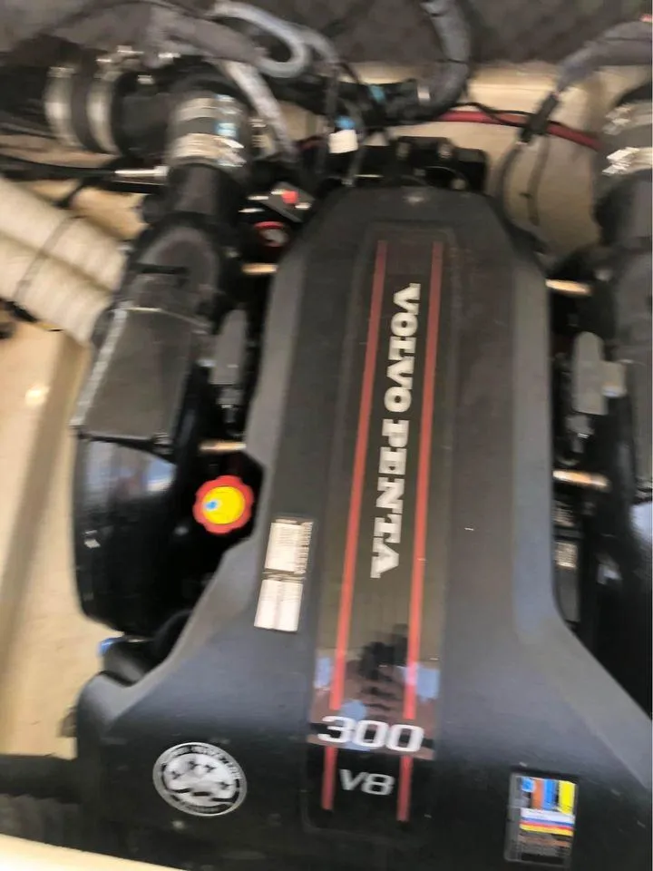 Slide: The Image of Volvo Penta 300 V8 engine in 2013 Rinker 246 Captiva Bowrider boat. - 9