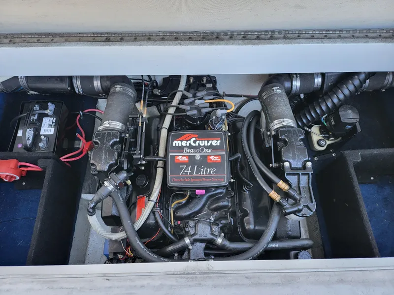 Slide: The Image of 1988 Wellcraft 220 Elite boat engine compartment with MerCruiser 7.4 Litre engine. - 7