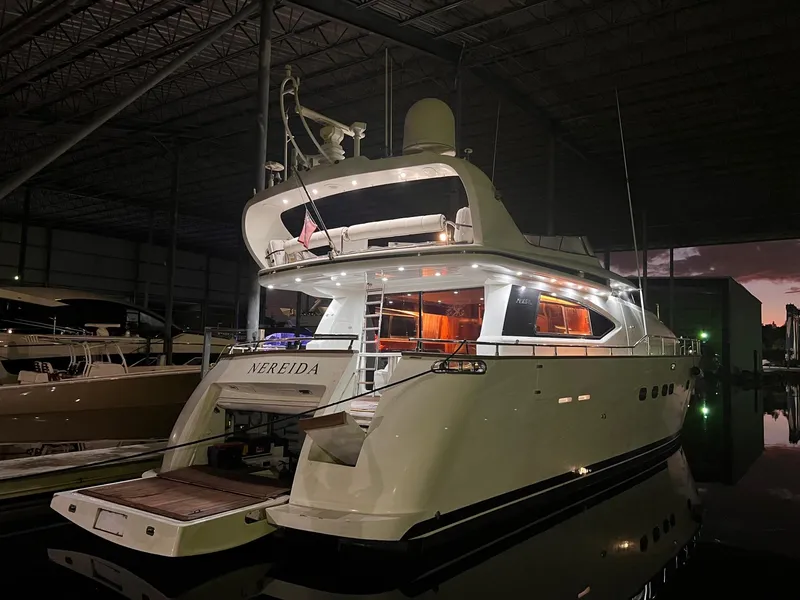 Slide: The Image of Maiora 20 yacht, 2001 model, docked in a dimly lit marina. - 1