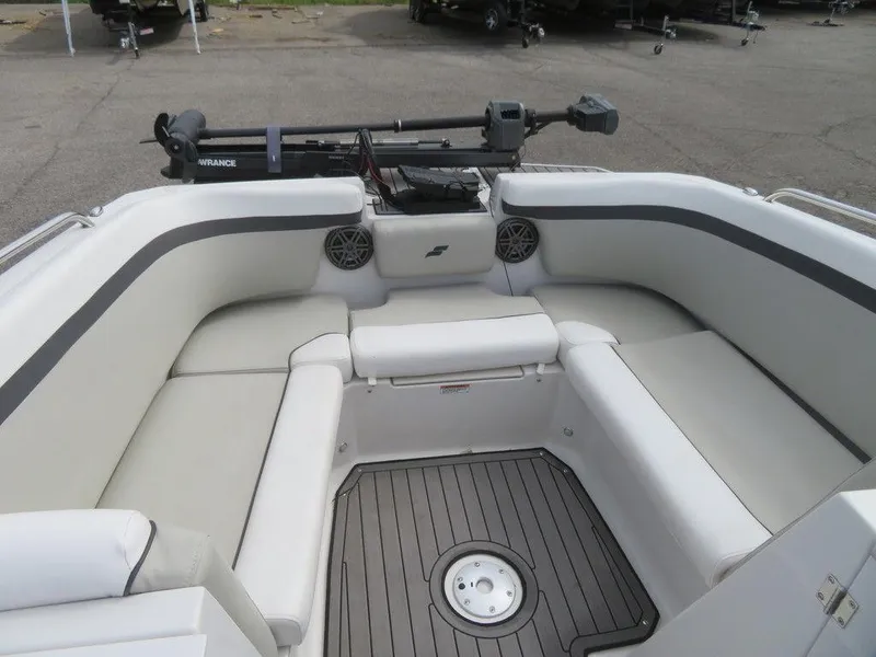 Slide: The Image of 2022 Starcraft 231 OB boat with spacious seating and modern amenities. - 22