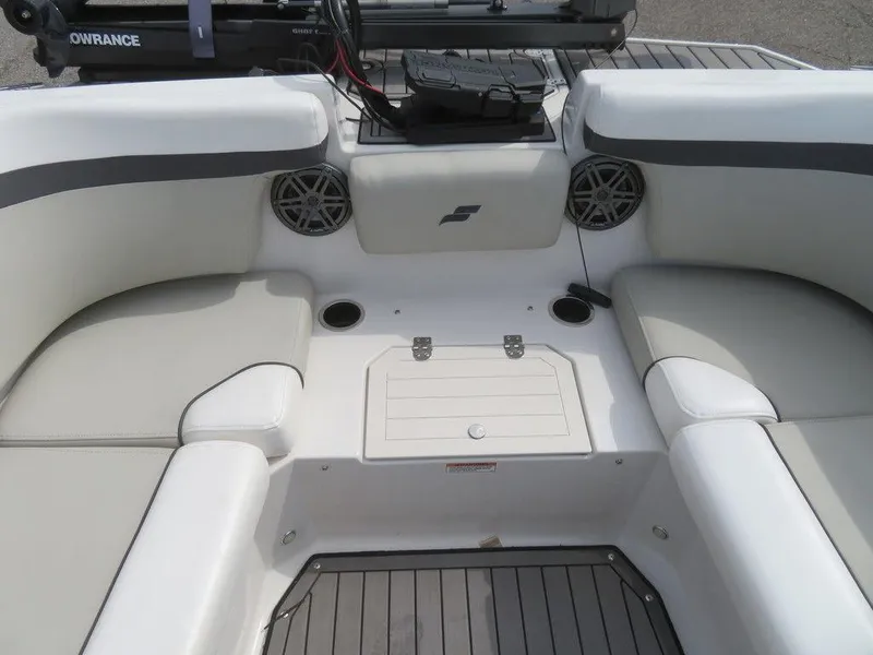 Slide: The Image of 2022 Starcraft 231 OB boat interior with cushioned seating and storage compartments. - 25