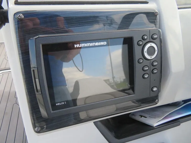 Slide: The Image of Humminbird Helix 5 fishfinder on 2022 Starcraft 231 OB boat dashboard. - 7