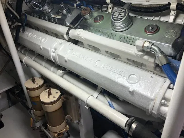 Slide: The Image of 1997 Bertram Convertible engine room with Detroit Diesel engines. - 24