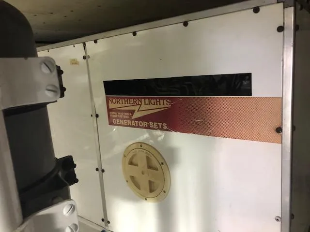 Slide: The Image of Northern Lights generator set in a 1997 Bertram Convertible boat. - 35