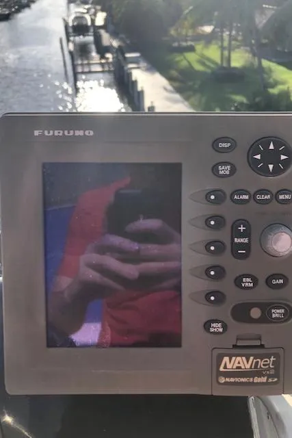 Slide: The Image of Furuno NAVnet marine GPS system on a 1997 Bertram Convertible boat. - 39