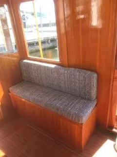 Slide: The Image of 1992 Crosby Tug interior with cushioned bench seating - 10
