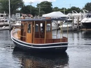 Slide: The Image of 1992 Crosby Tug boat in marina, wooden cabin, named Siesta Key. - 4
