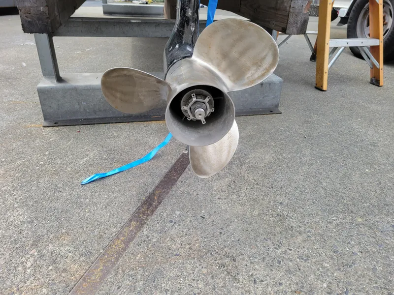 Slide: The Image of Propeller of a 1973 Donzi X18 boat on a concrete surface. - 17