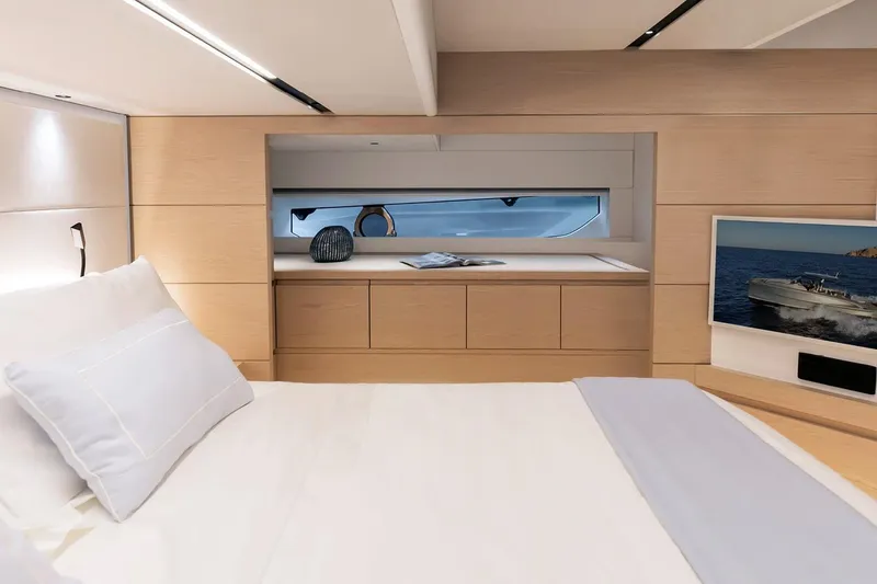 Slide: The Image of Luxurious interior of 2027 Solaris Power 52 Open yacht with modern design and comfortable bedding. - 8