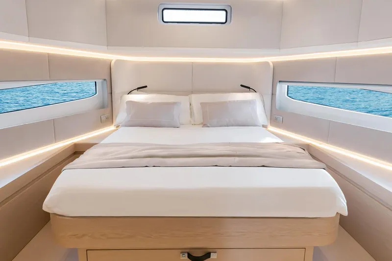 Slide: The Image of Luxurious bedroom interior of 2027 Solaris Power 52 Open yacht with ocean view. - 9
