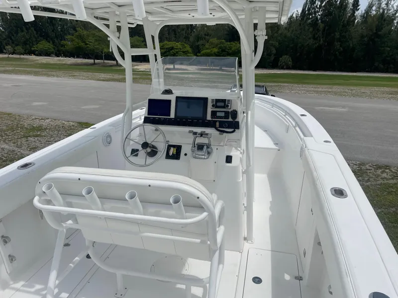 Slide: The Image of 2006 Angler 2900CC center console boat with modern navigation equipment. - 14