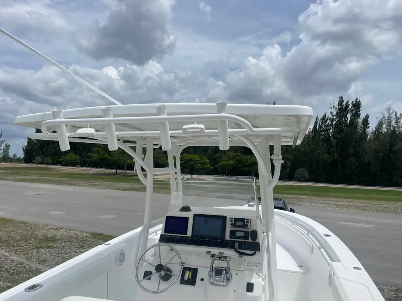 Slide: The Image of 2006 Angler 2900CC boat with center console and navigation equipment. - 15