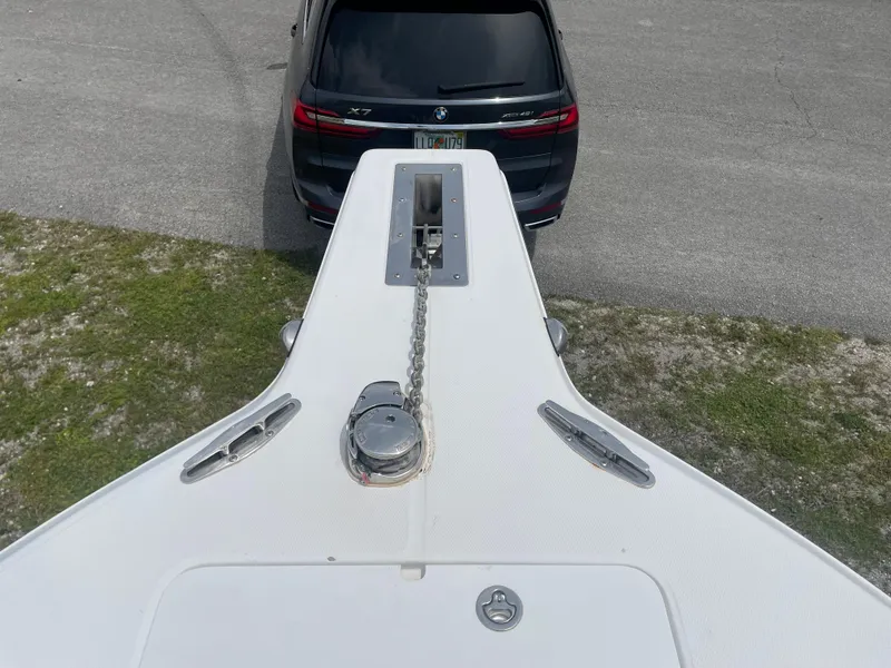 Slide: The Image of Top view of a 2006 Angler 2900CC boat's bow with anchor chain. - 33