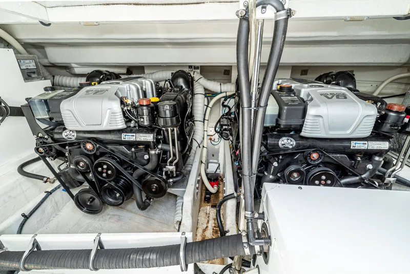Slide: The Image of 2017 Cruisers Yachts 390 Express Coupe engine compartment with twin V8 engines. - 36