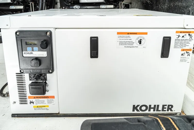 Slide: The Image of Kohler generator on a 2017 Cruisers Yachts 390 Express Coupe. - 39