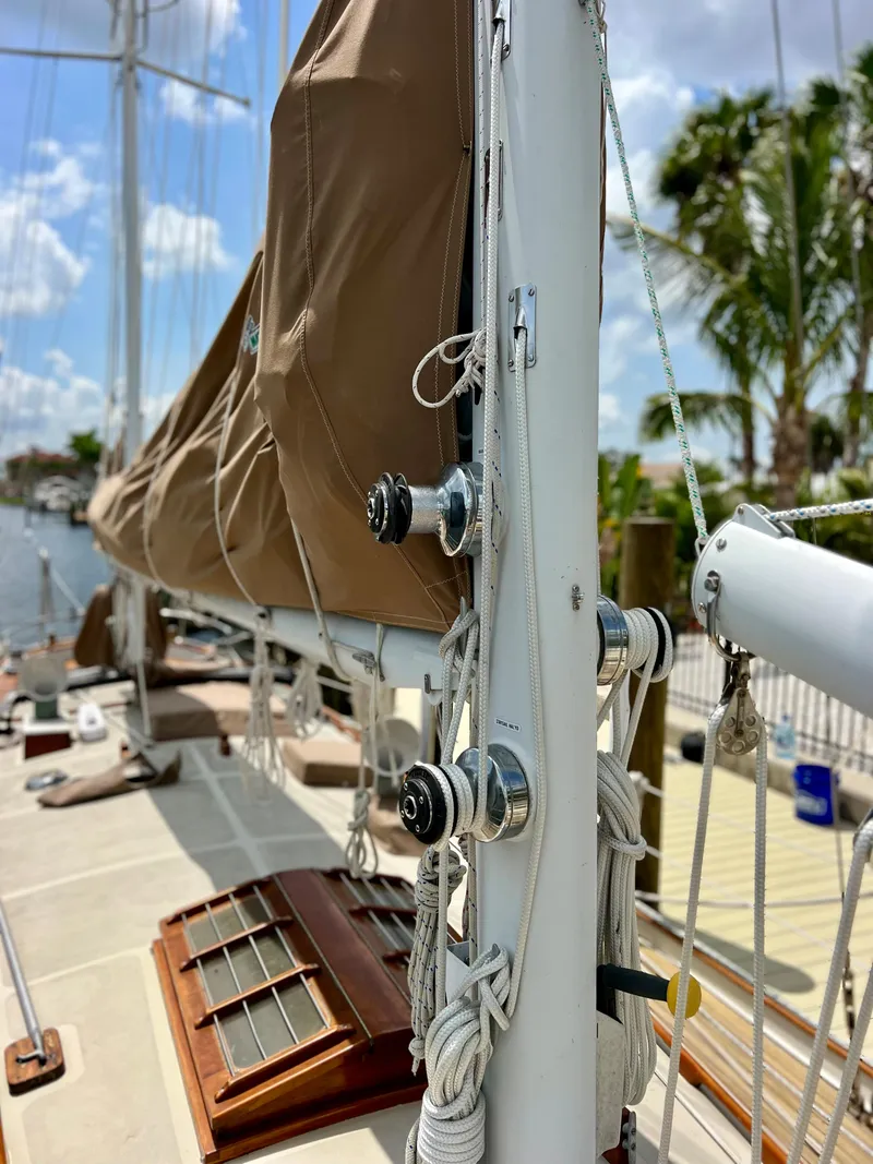 Slide: The Image of 1986 Cherubini 44 sailboat deck with rigging and mast details. - 17
