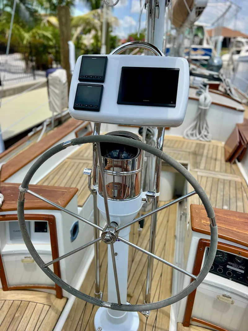 Slide: The Image of Steering wheel and navigation system on a 1986 Cherubini 44 sailboat. - 29