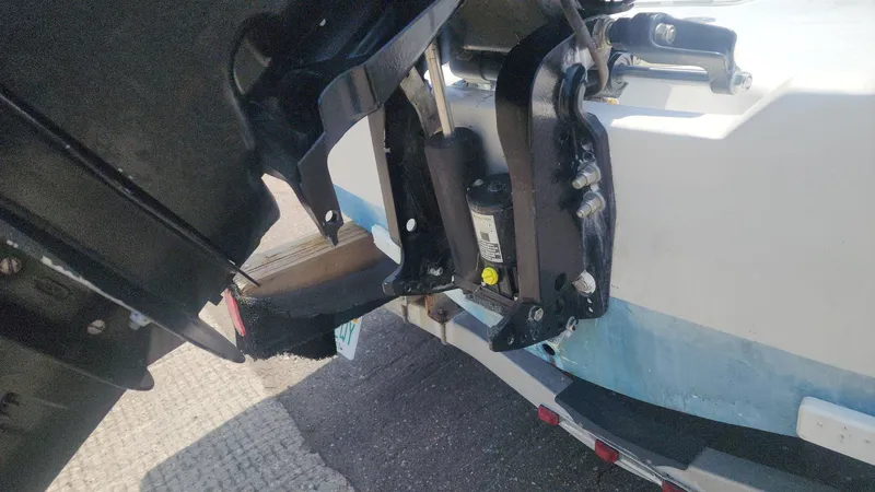 Slide: The Image of 1976 Boston Whaler 17 Montauk boat motor and transom detail. - 48