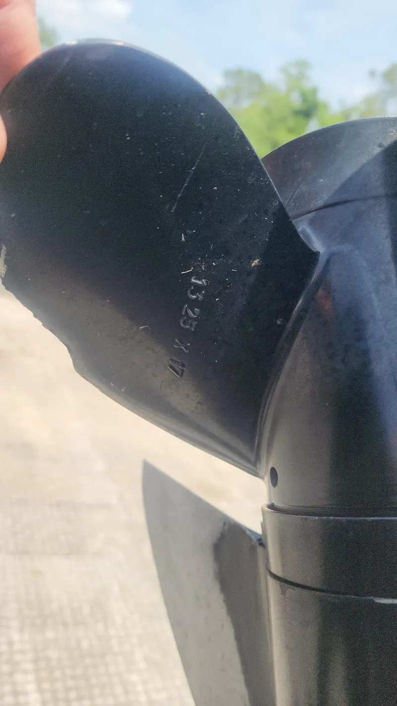 Slide: The Image of Close-up of a boat propeller on a 1976 Boston Whaler 17 Montauk. - 49