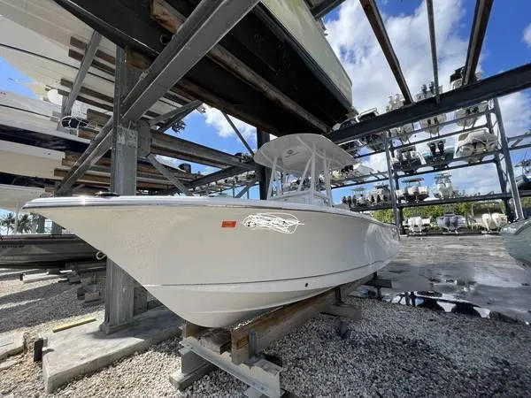 Slide: The Image of 2022 Sea Hunt Ultra 229 boat in storage facility. - 3