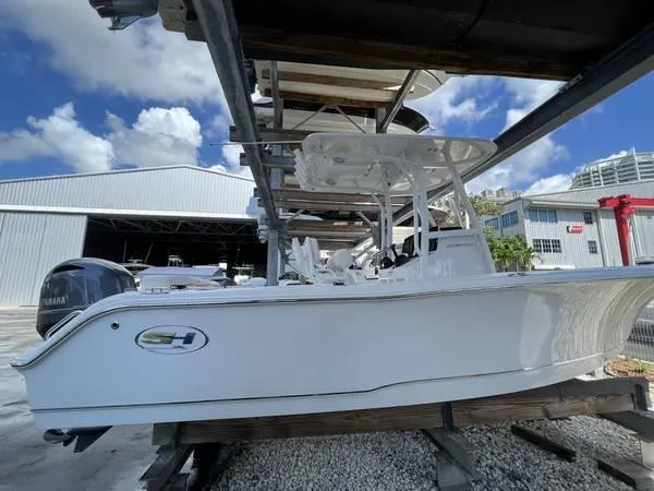 Slide: The Image of 2022 Sea Hunt Ultra 229 boat in storage, side view. - 4