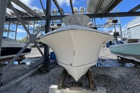 Slide: The Image of 2022 Sea Hunt Ultra 229 boat in storage facility. - 7