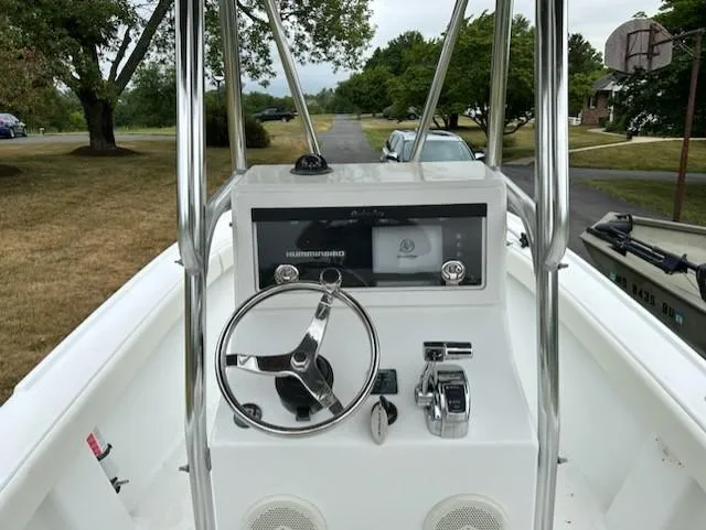 Slide: The Image of 2012 Onslow Bay 20 boat console with steering wheel and controls. - 7