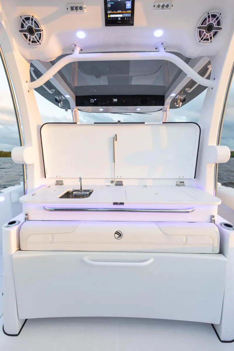 Slide: The Image of 2024 Edgewater 370CC boat interior with modern amenities and sleek design. - 16