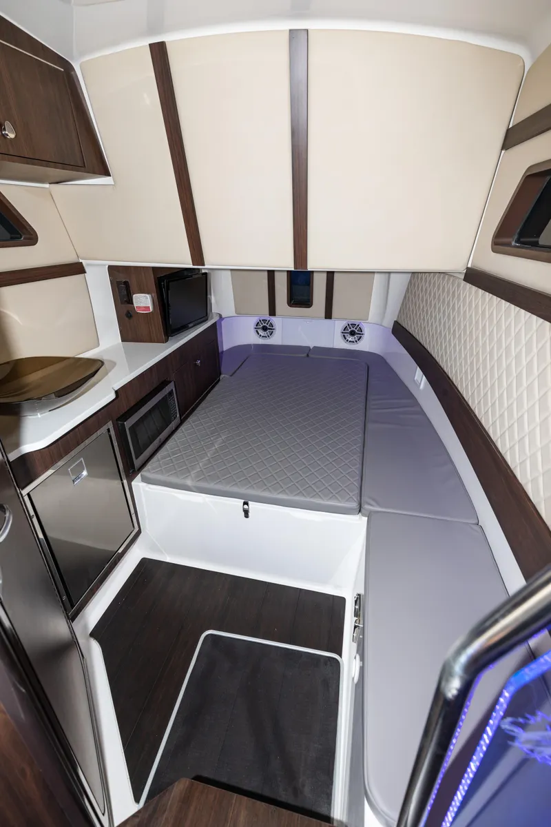 Slide: The Image of 2024 Edgewater 370CC cabin interior with modern amenities. - 26