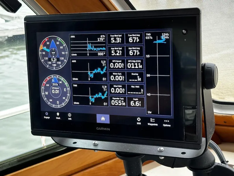 Slide: The Image of Garmin marine display on 2008 Sabre 42 Hard Top Express, showing navigation and performance data. - 16